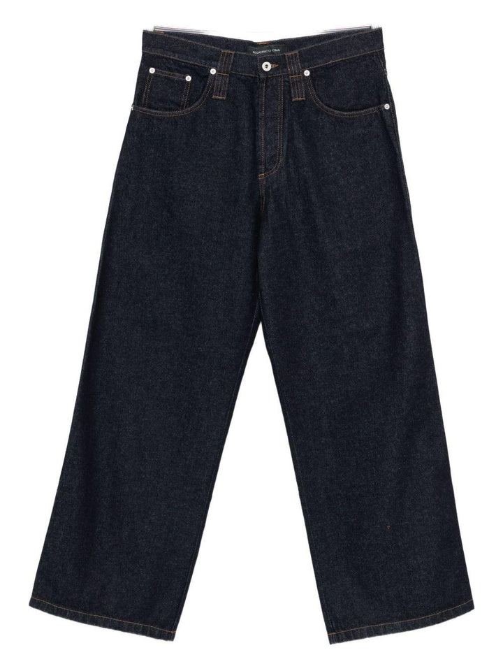 Jeans blu con cuciture a contrasto 
