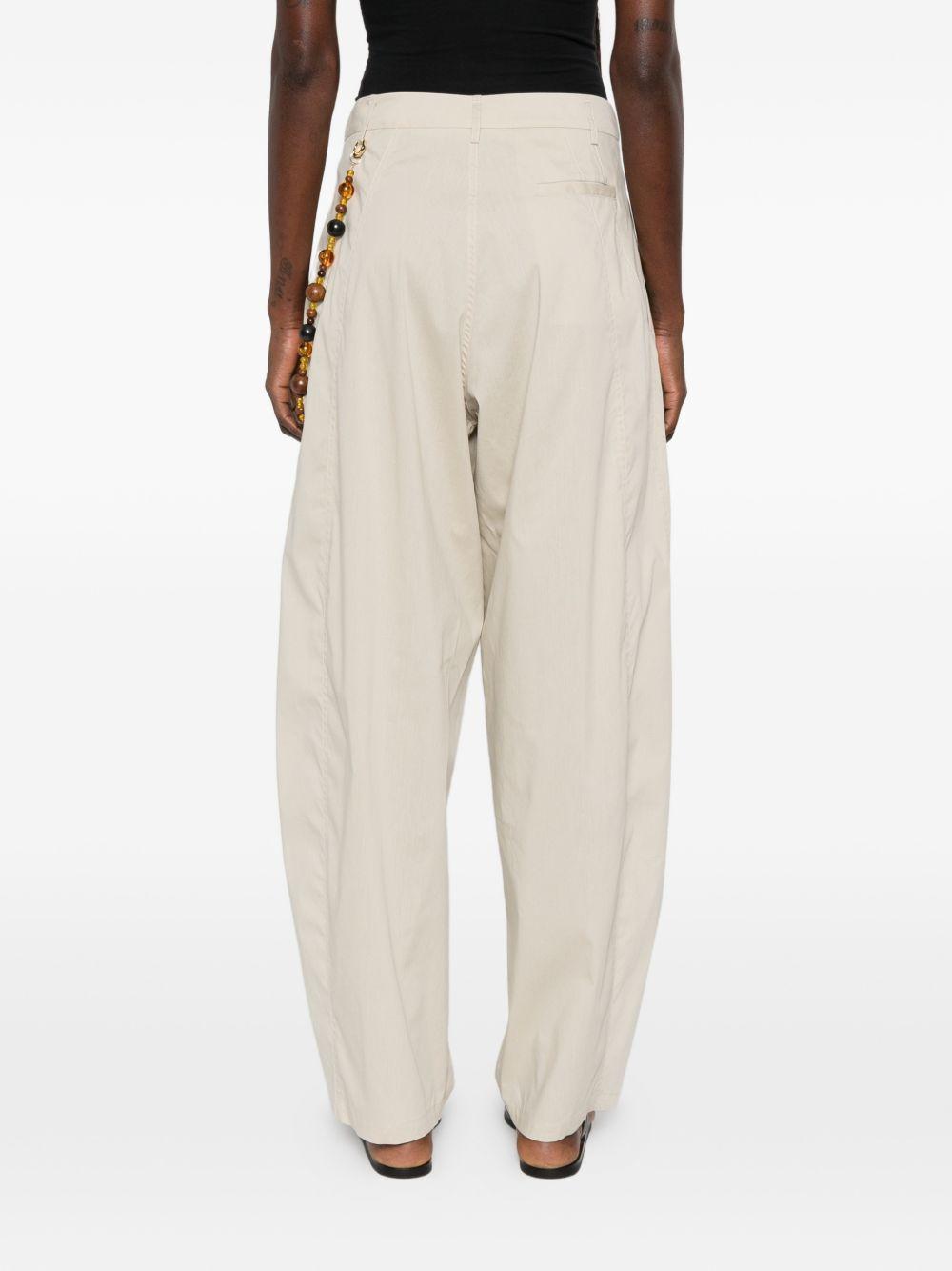 Pantaloni con perline 