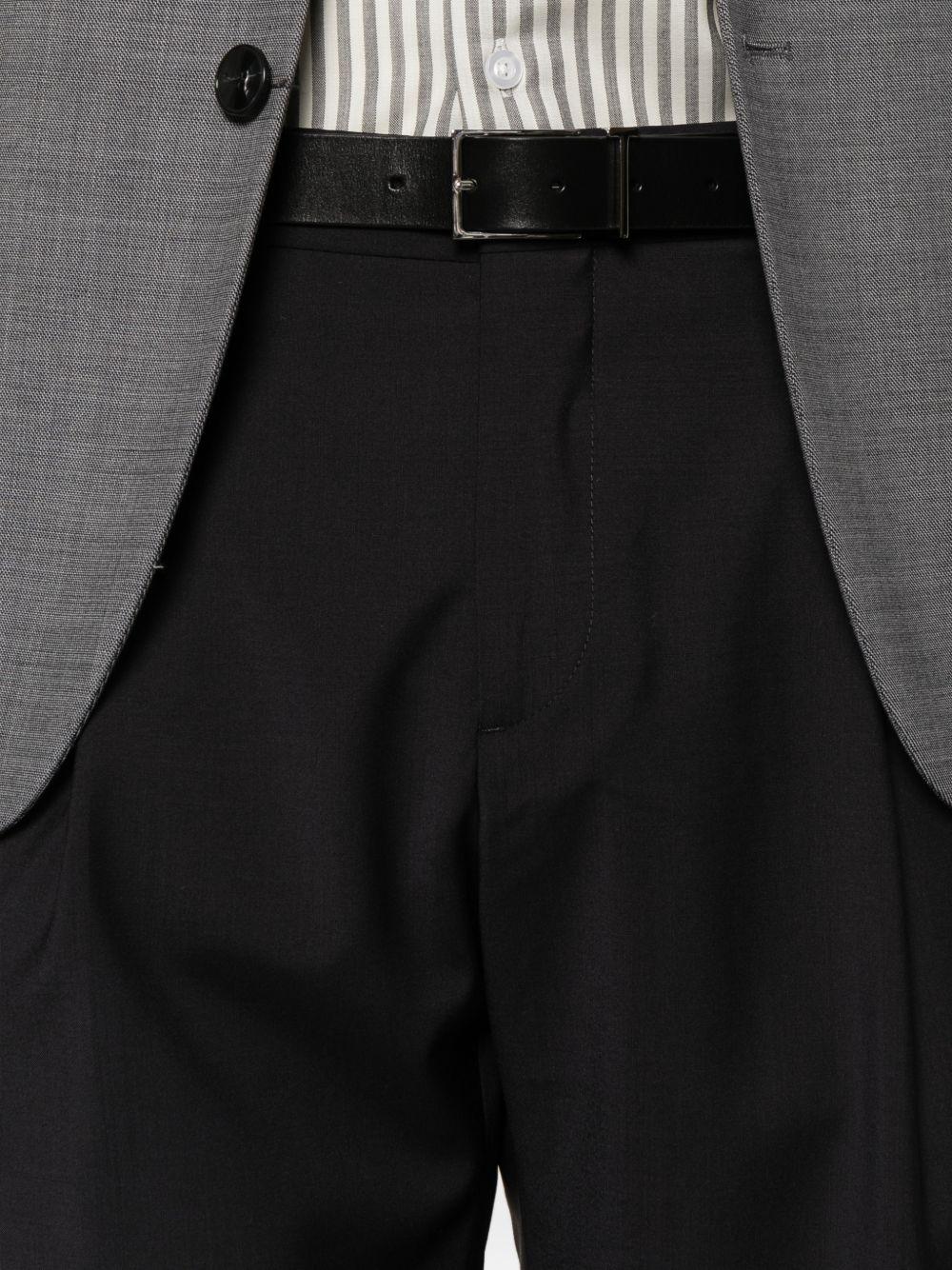 Pantaloni sartoriali blu navy con pieghe 
