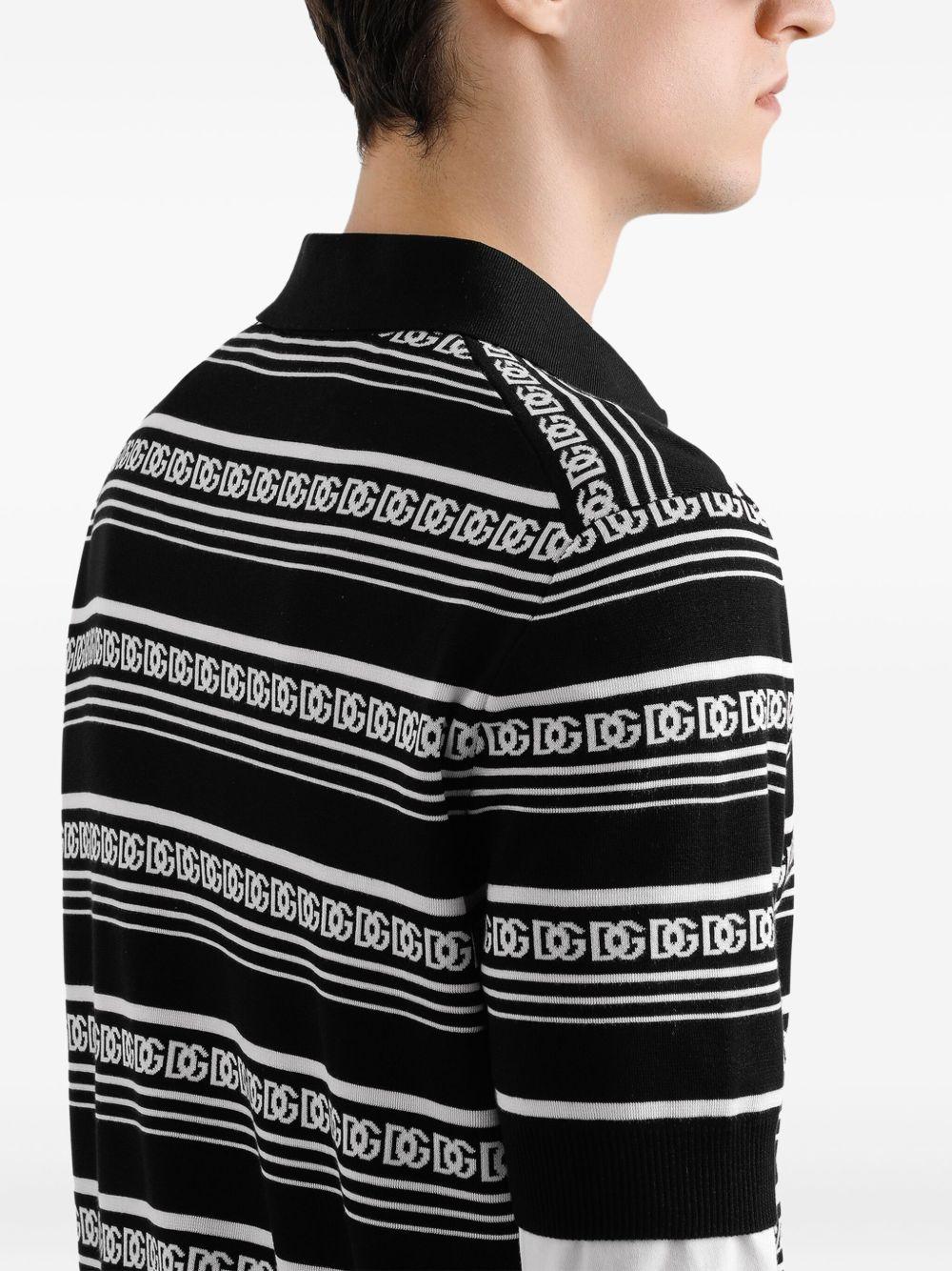 Polo nera in seta con logo all-over 