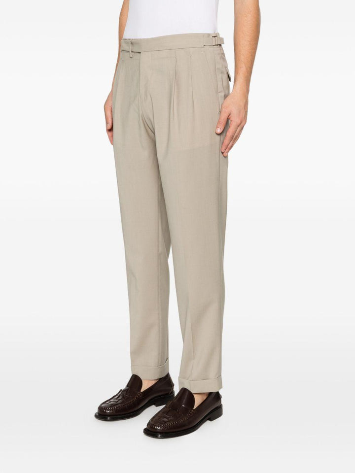 Pantaloni sartoriali kaki con pieghe 