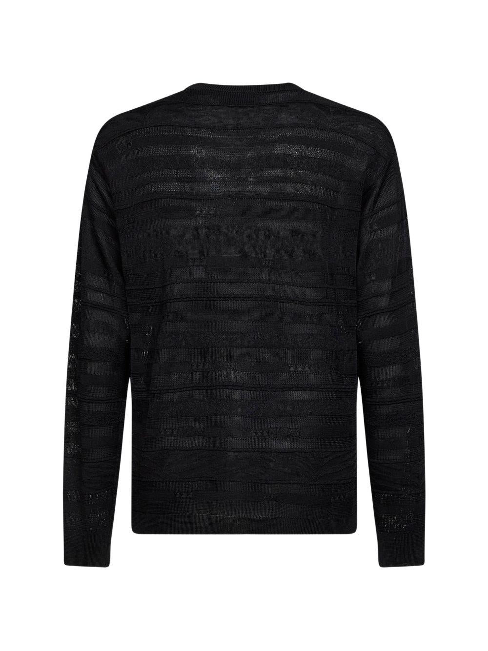 Maglia nera a righe 