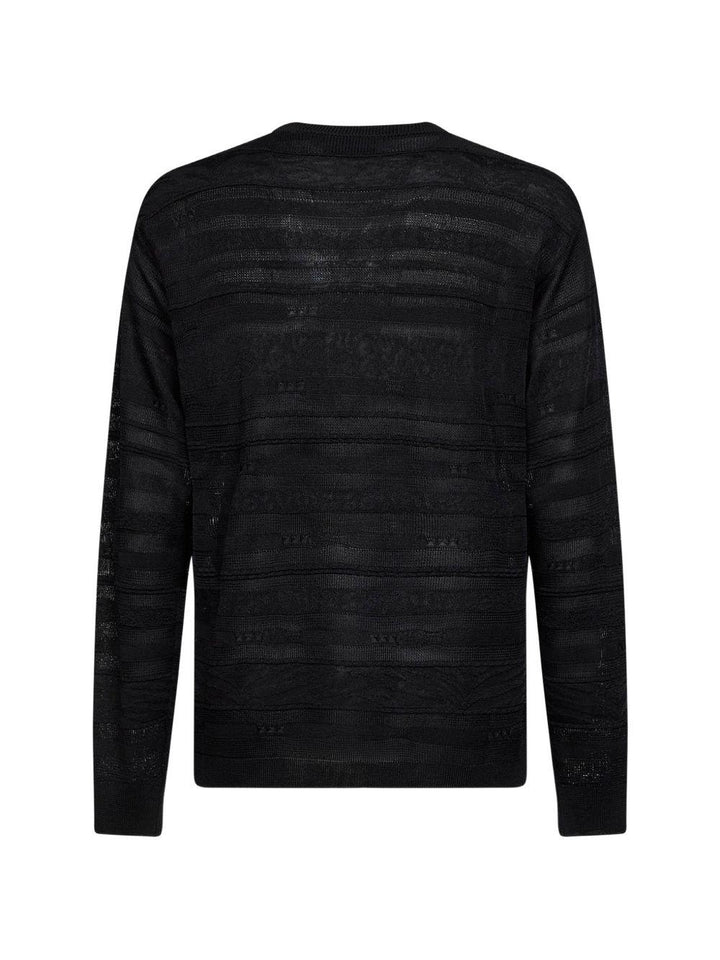 Maglia nera a righe 