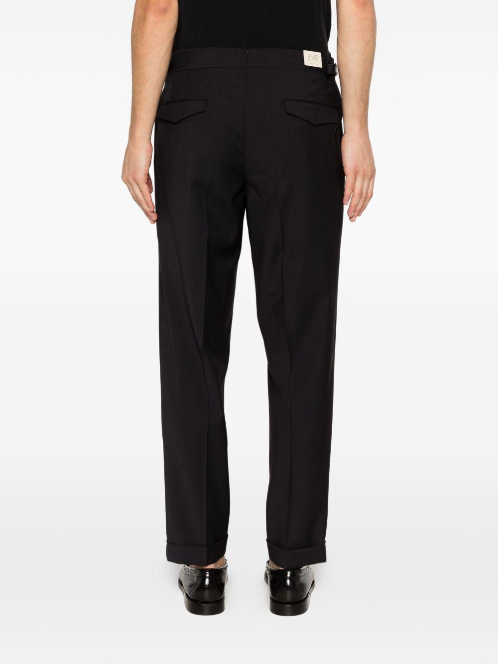 Pantaloni sartoriali blu navi con pieghe 