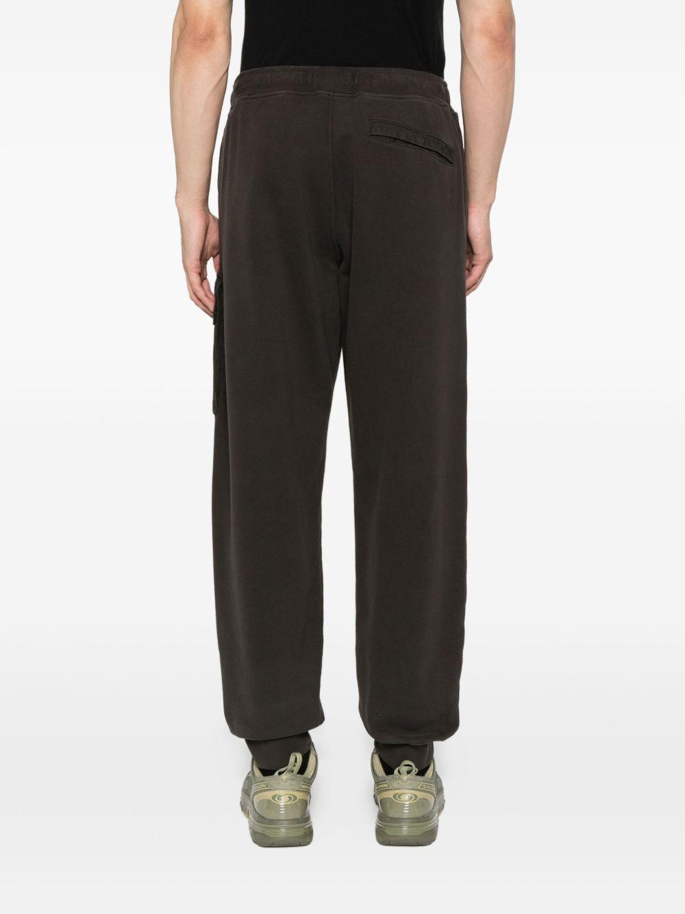 Pantaloni sportivi grigio scuro con applicazione logo 