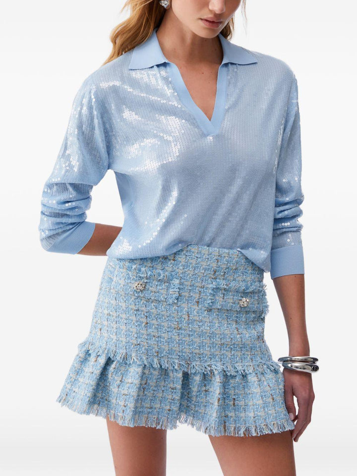 Polo con paillettes 