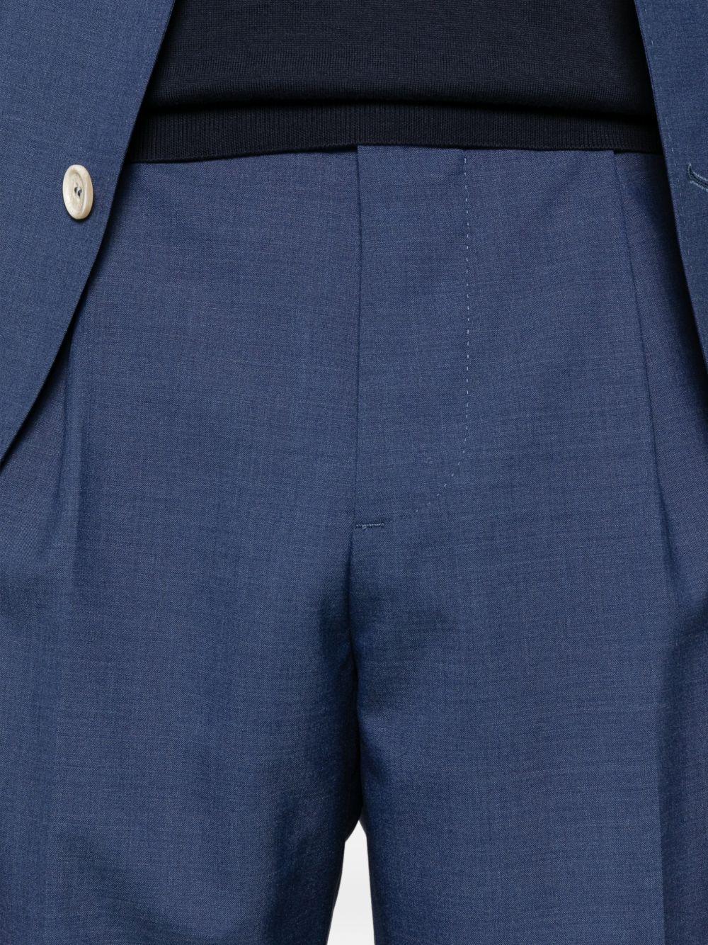 Abito monopetto con revers a lancia blu royal 