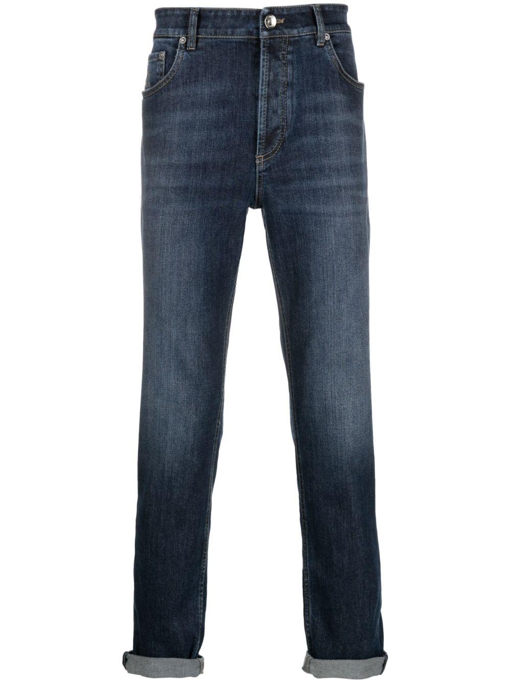Jeans blu a vita media con logo inciso 