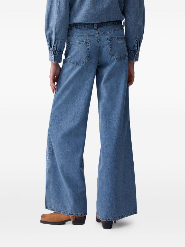 Jeans svasati con ricamo 