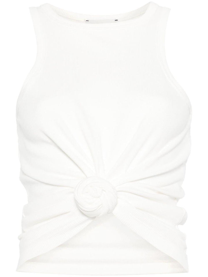 Top con fiore 