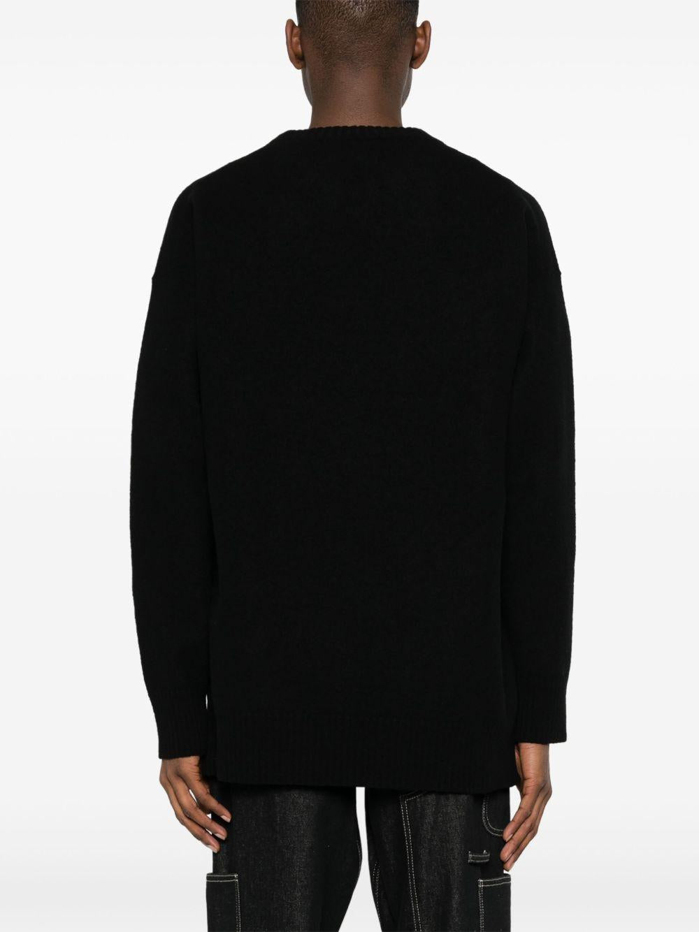 Maglione blu con spacco laterale 
